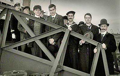 the guarantee group posing on the gangplank