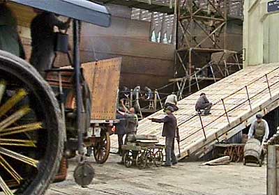 unloading one of the steel plates for the hull